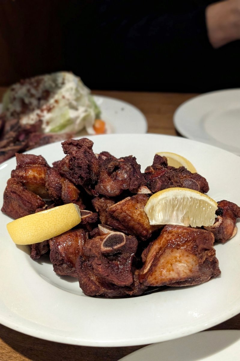 Crispy bone-in short dry ribs at Wellington’s Steakhouse in Calgary