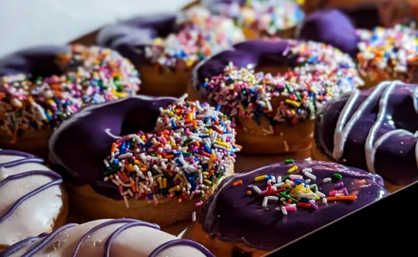 Assorted sprinkle-covered donuts at Grandad’s Donuts in Hamilton.