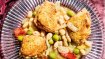 Image for Crispy chicken thighs over vinegar beans from A Generous Meal cookbook