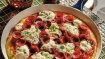 Pepperoni pizza polenta topped with burrata, basil and pepperoni from Easy Does It by Christine Flynn