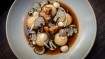 Image for Wildebeest&#039;s ravioli mushroom with consommé, garlic  purée and pickled  mushrooms 