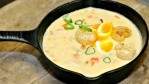 Spot prawn chowder with poached egg and chicharron