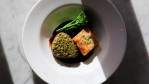Image for Cibo Trattoria's herb-crusted beef tenderloin with Parmesan potato pave