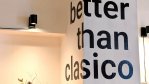 The words “better than clasico” painted on the wall inside the Prague restaurant Better Than Classico