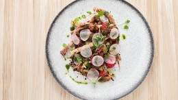 Image for Beach Bay Cafe's radish salad with olive soil and tarragon oil