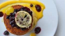 Image for Yellow Door Bistro's blueberry pancakes with blueberry thyme compote