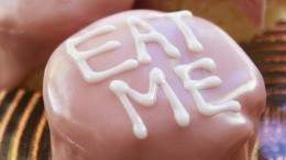 Cakes with Eat Me written in icing