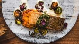 Image for Epic restaurant's salmon with maple sunchoke puree and chimichurri sauce