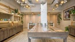 The store’s earthy design is a result of collaborating with local designers to create a green, living environment