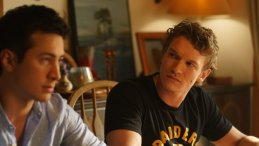 Scene from Heated Rivalry Season 1 finale showing Ilya Rozanov and Shane Hollander sharing a pasta meal at the cottage.