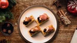 Image for Bridgette Bar's caramelized mozzarella crostini with cherry black pepper jam and prosciutto