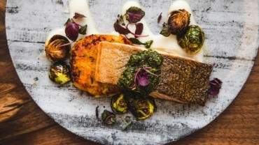 Image for Epic restaurant's salmon with maple sunchoke puree and chimichurri sauce