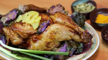 Spatchcocked chicken from Sai Woo. Photo by Kira Clavell.