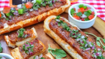 Image for Queen of the Grill’s sausage boats with chimichurri