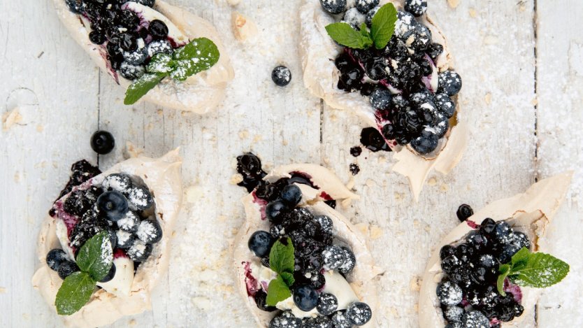 Image for Araxi's lavender meringues with blueberries and mint