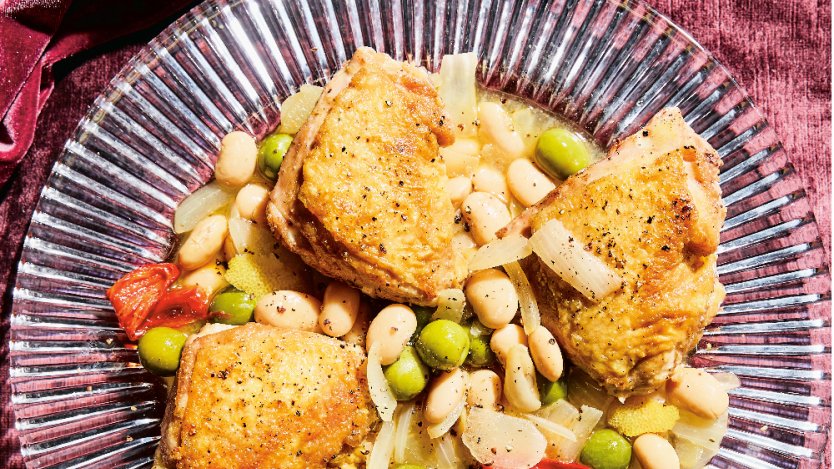 Photos and recipe provided by Penguin Random House. Image for Crispy chicken thighs over vinegar beans from A Generous Meal cookbook