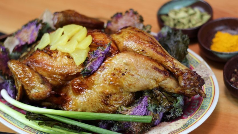 Spatchcocked chicken from Sai Woo. Photo by Kira Clavell.
