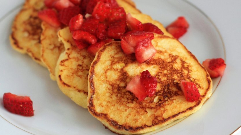 Lemon soufflé pancakes with macerated strawberries from Pucker cookbook ...